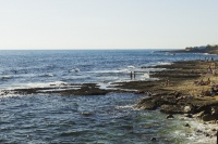 Bathers enjoy the sea on the Blue coast